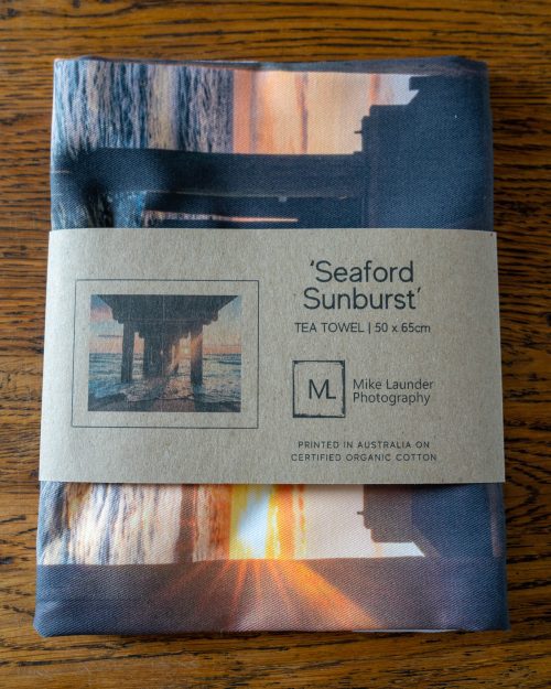 Seaford Beach tea towel in packaging.