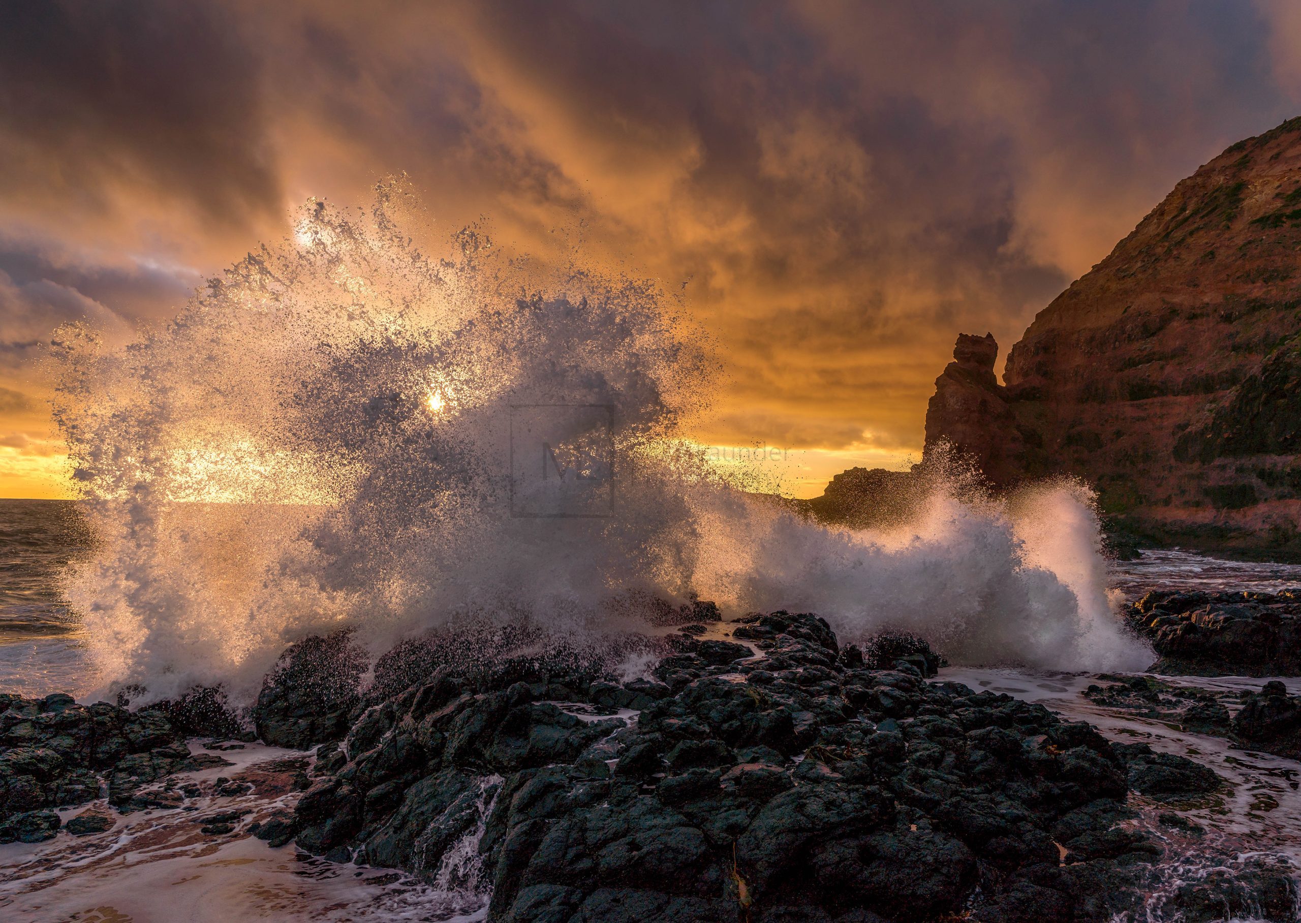 Splashing wave on rocks at Cape Shanck